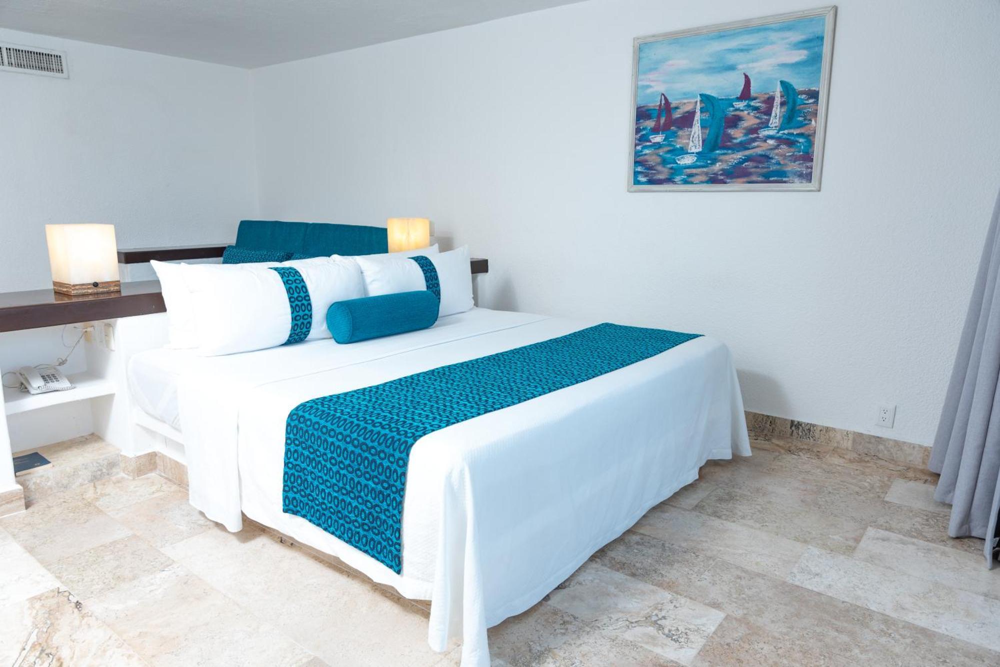 Ritz Acapulco All Inclusive Kültér fotó A bedroom at the hotel